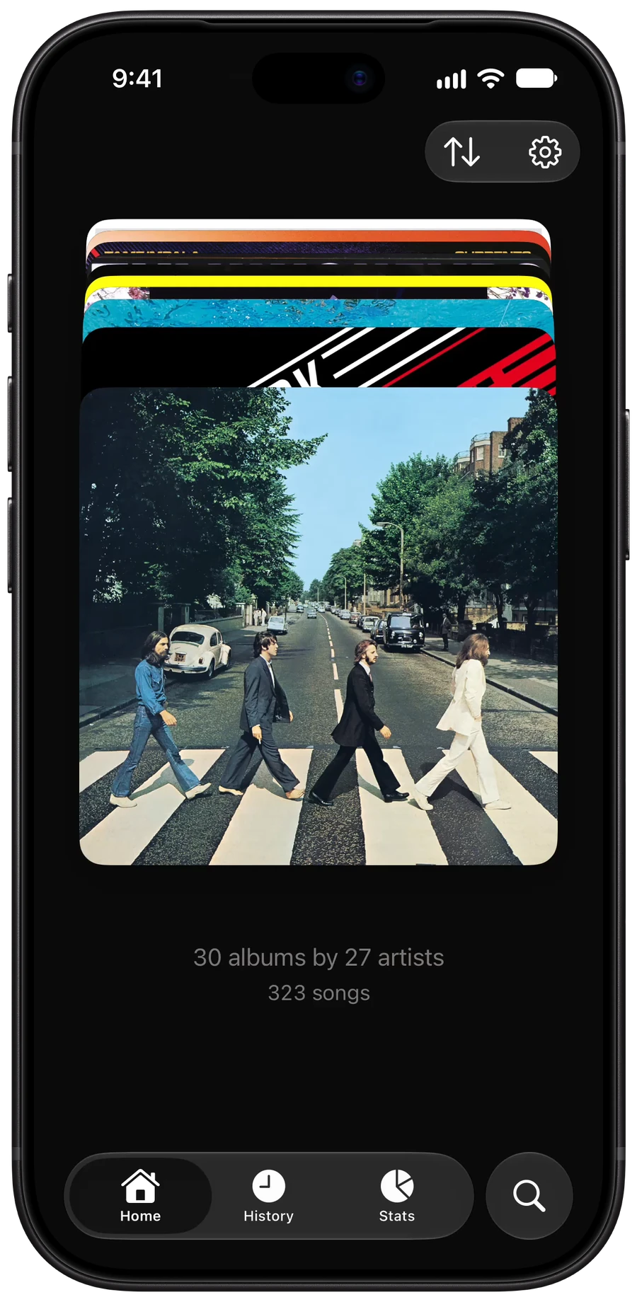 Winyl’s Home on an iPhone: a stack of album covers with Abbey Road by The Beatles at the front, and “30 albums by 27 artists, 323 songs” under it.